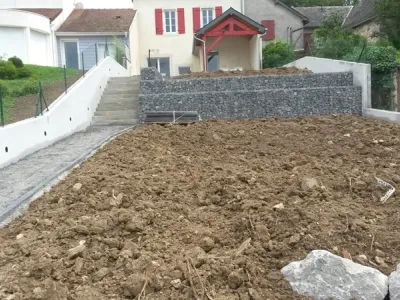 Préparation du sol et apport de terre pour aménagement paysager